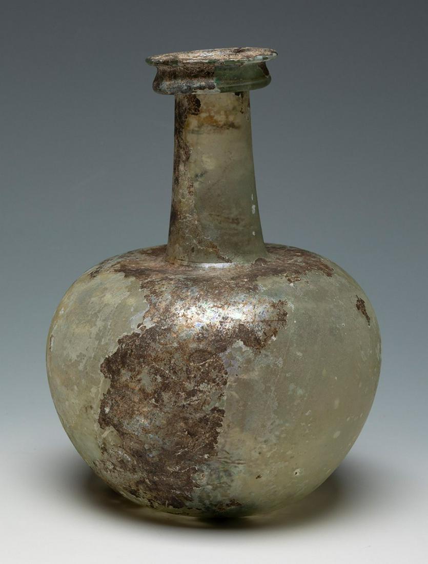 Ampoule-perfumery. Rome, 2nd-1st century BC. Blown glass. In very good condition.: Ampoule-perfumery. Rome, 2nd-1st century BC. Blown glass. In very good condition. Attached is a report issued by Ricardo Batista Noguera, former director of the Archaeological Museum of Barcelona, of 