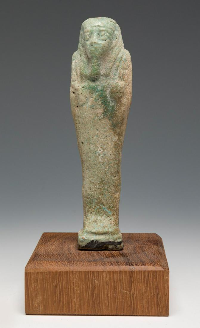 Ushebti; Egypt, Lower Egypt, Ptolemaic period, 2nd-1st century BC. Fayenza. Wooden base. Attached (1 of 4)
