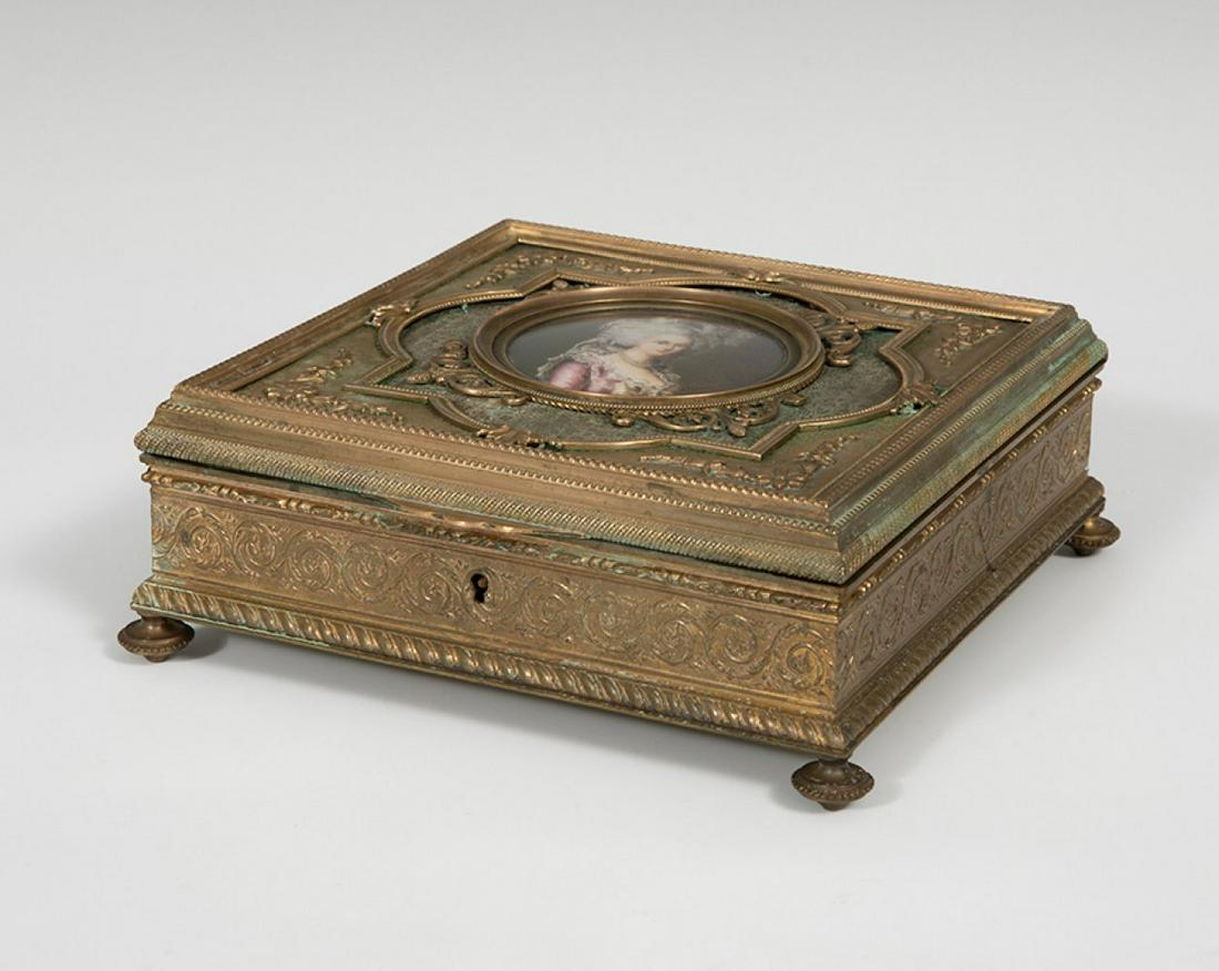 Jewellery box. France, second half of the 19th century. Gilt bronze and vellum plate painted in (1 of 4)