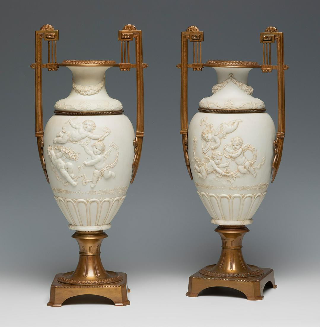Pair of vases. France, 19th century. Biscuit and bronze. (1 of 5)