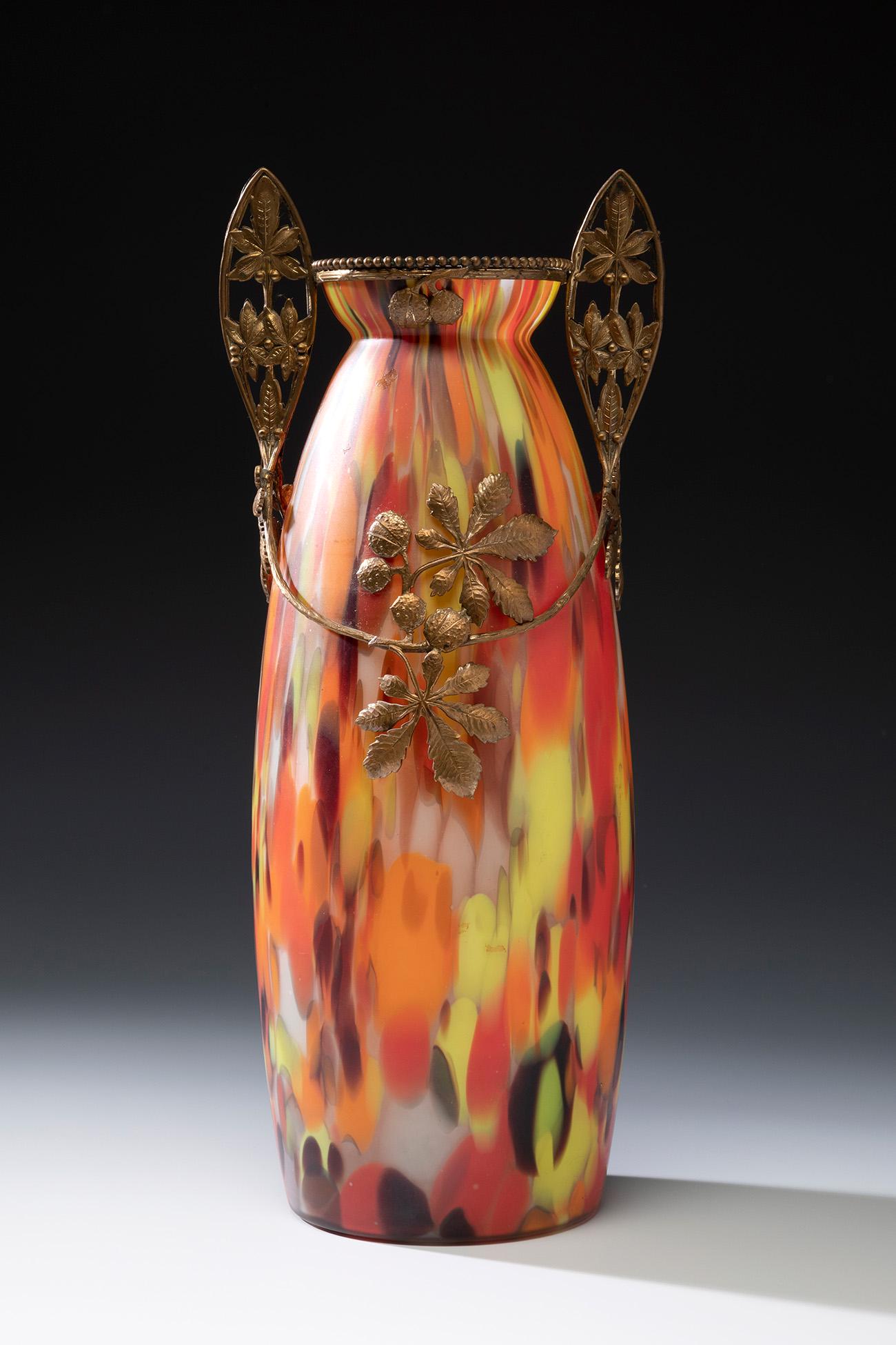 Jugendstil LOETZ vase; Austria, ca. 1900. Iridescent blown glass. An iridescent blown glass vase (1 of 5)