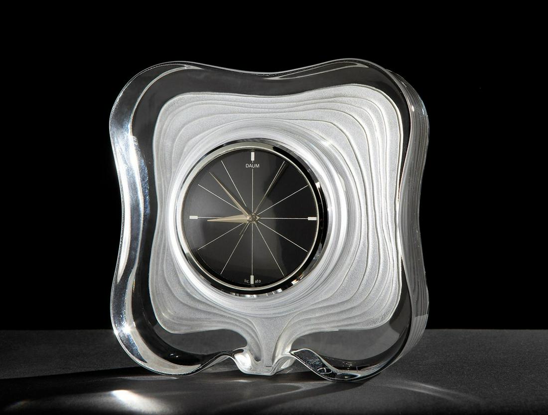 DAUM. France, ca. 1960. Table clock.  Clear glass with wavy satin-finished decorations on the (1 of 5)