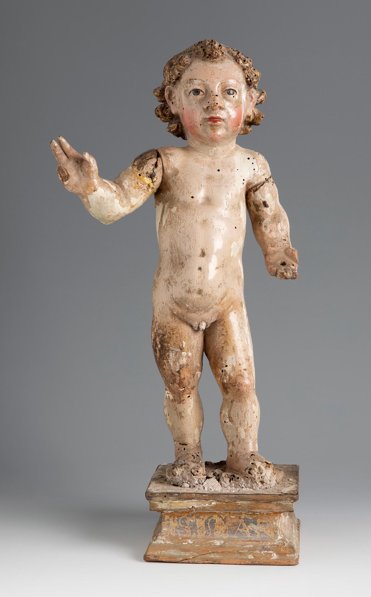 Spanish school, 17th century. "Infant Jesus Salvator Mundi". Carved and polychrome wood. Faults in (1 of 5)
