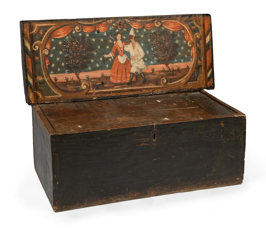 A seaman's chest from the 17th-18th century. Wood, with polychrome lid on the inner side. Original: A 17th-18th century sailor's chest. Wood, with polychrome lid on the inner side. Original lock. Loose upper lid. The lower lid is later. It shows wear due to use and the passage of time. Traces of xyl