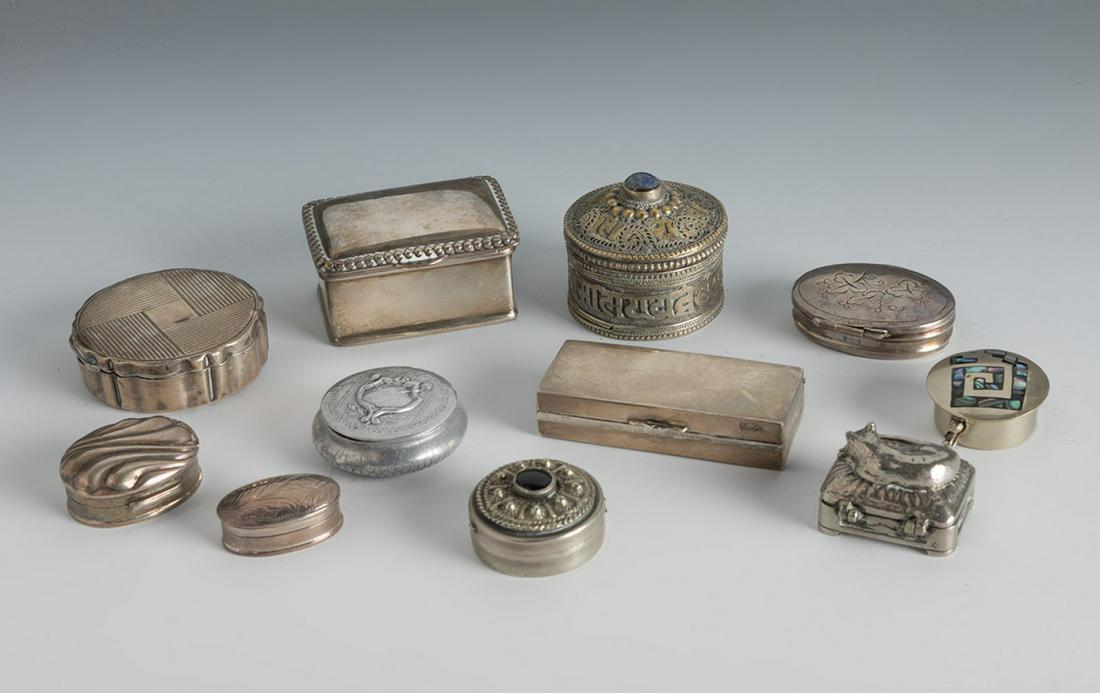 Set of eleven small pillboxes.  19th-20th century. Silver, silver plated metal and stones. Contrasts (1 of 3)