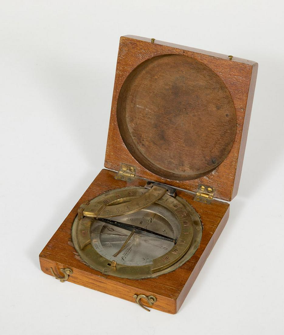 Maritime compass; 19th century. Carved wood and gilt metal. In need of restoration. (1 of 3)