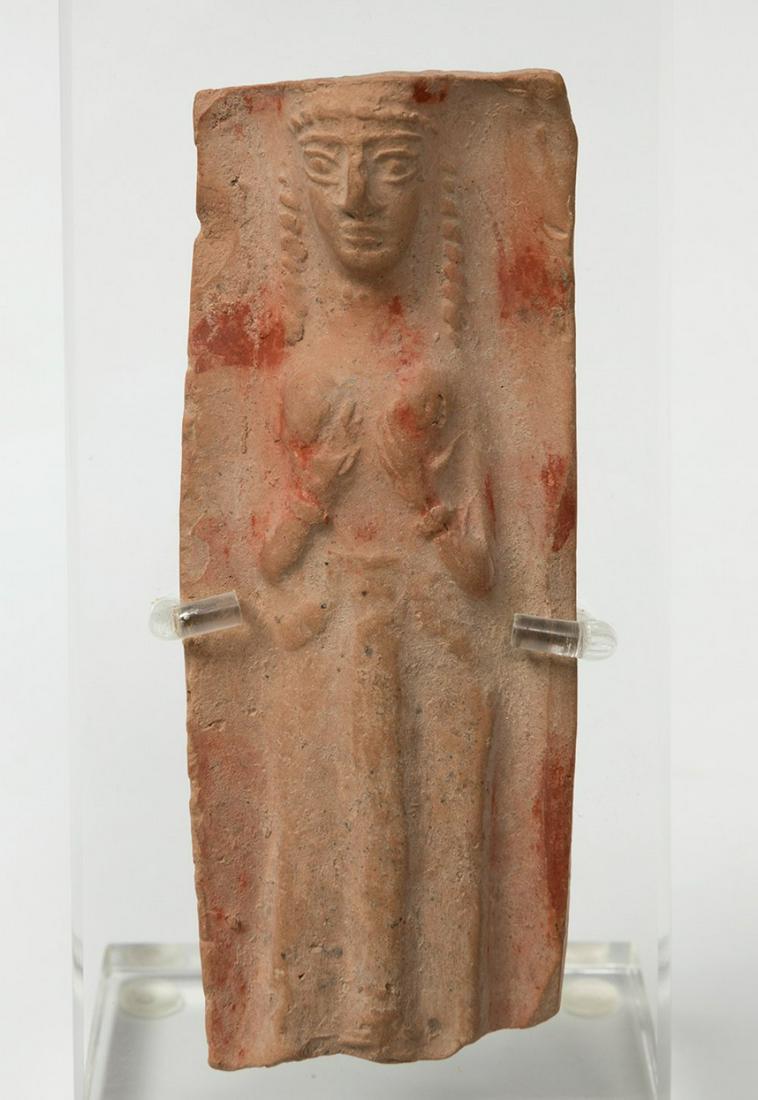 Plaque with the goddess Isthar; Babylon, 2000-1700 BC. Reddish terracotta. (1 of 5)