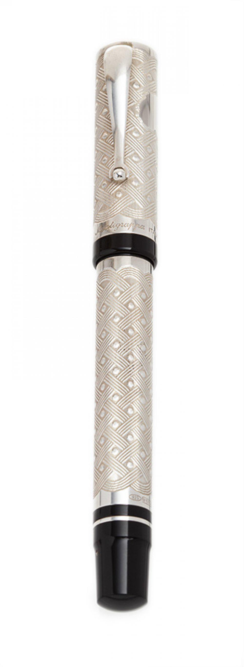 MONTEGRAPPA FOUNTAIN PEN â€œCOSMOPOLITAN AFRICAâ€, 1997. Body in embossed silver and black resin. (1 of 3)