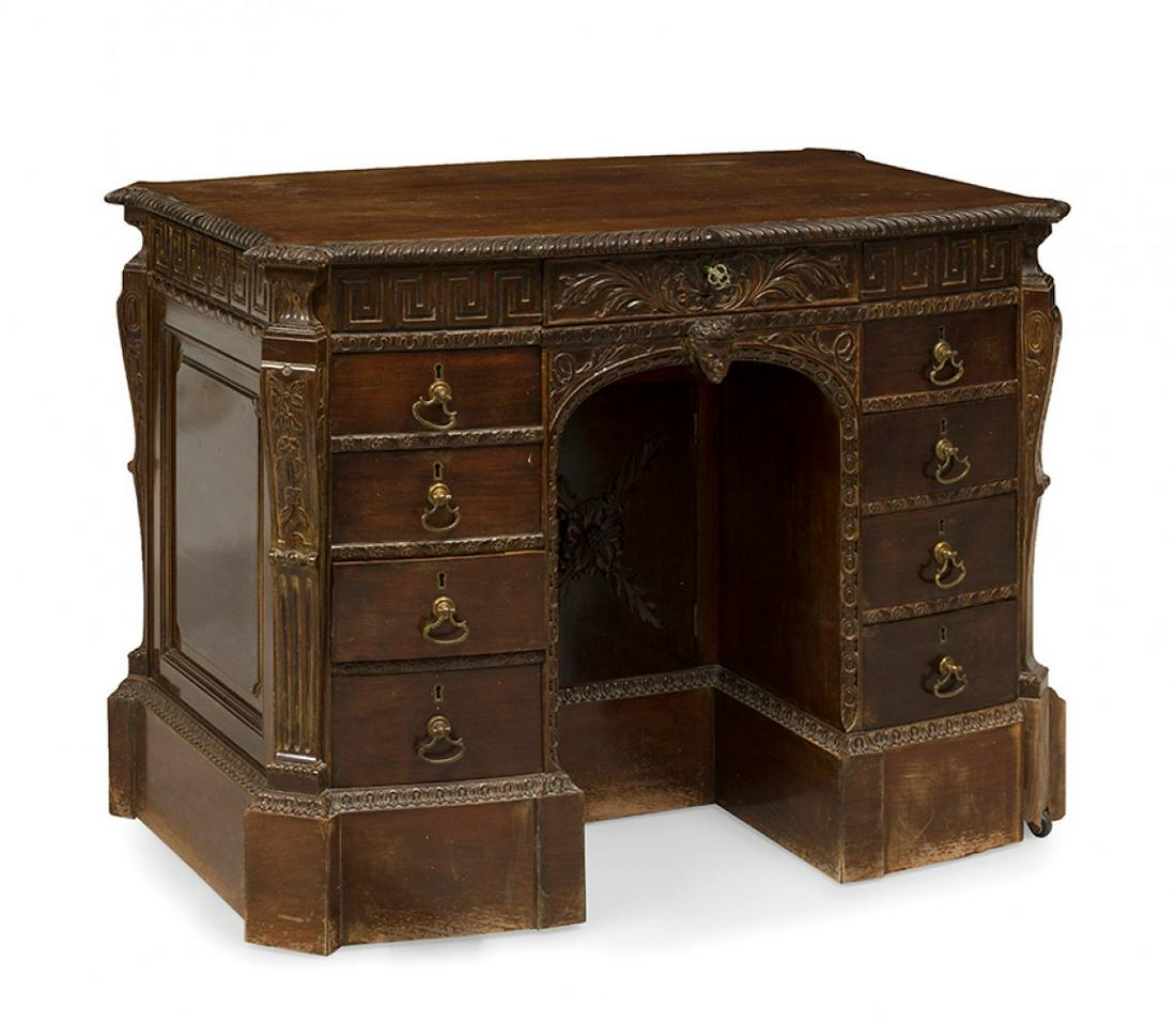 Writing table modelled after William Kent, 18th century; Spain-England, 20th century. Wood. With: Writing table modelled after William Kent, 18th century; Spain-England, 20th century. Wood. With marks of use, wear and loss of key. Provenance: Private Collection of Luis GarcÃ­a Berlanga. Measurem