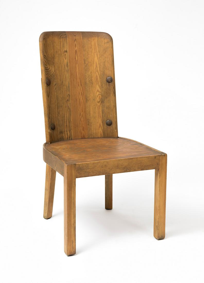 AXEL EINAR HJORTH (Sweden, 1888-1959). Lovo chair. Wood. Presents marks of use. (1 of 7)