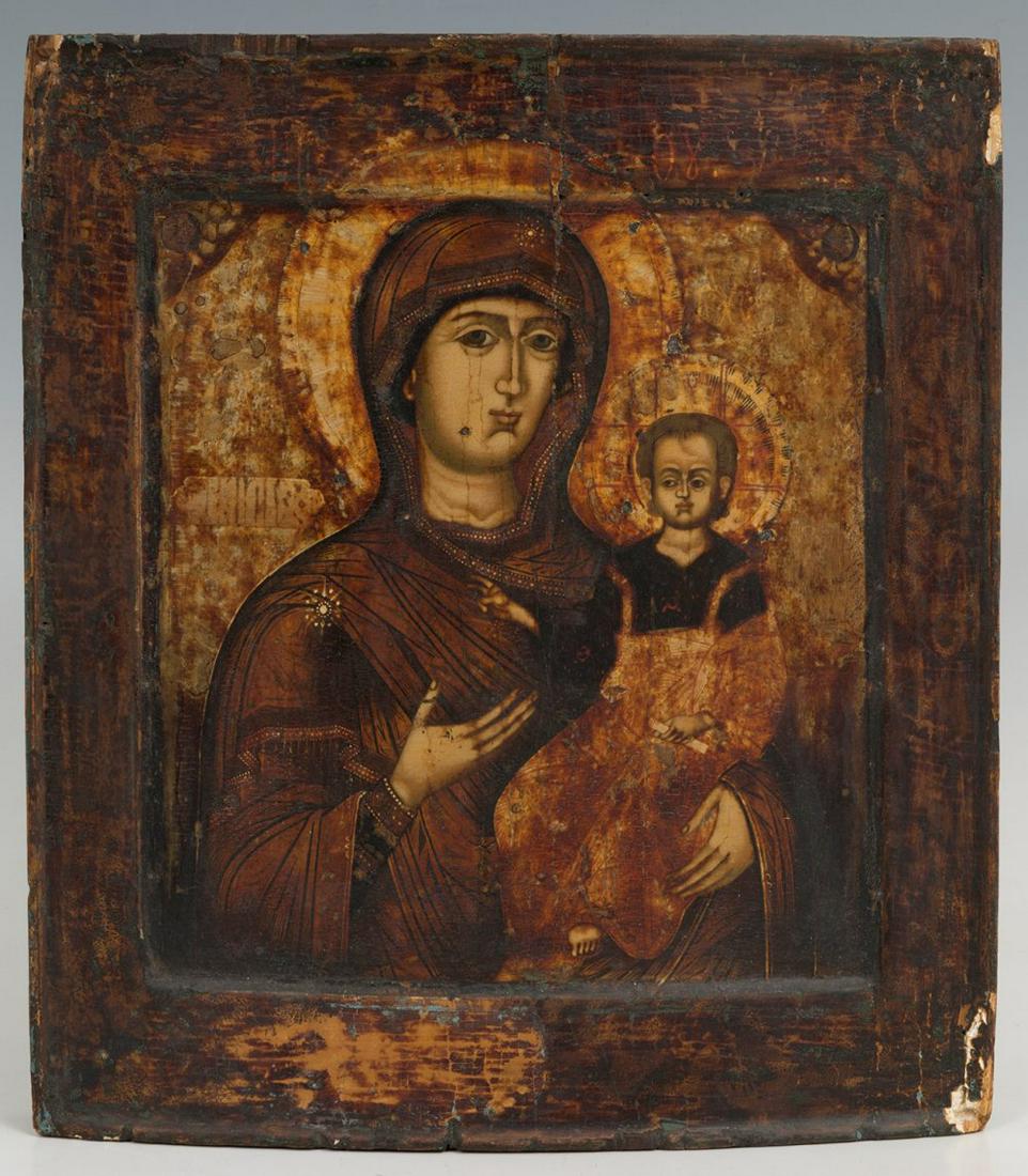 19th century Russian icon. "Virgin with Child". Oil on table. It presents faults and jumps. (1 of 4)