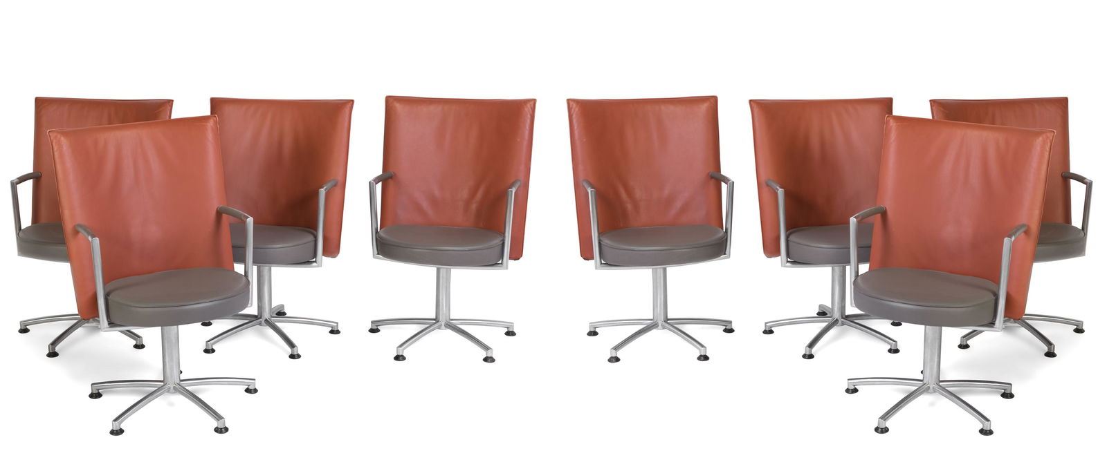 JOHANNES FOERSOM (Denmark, 1947). Set of eight chairs. Aluminum base and leather upholstery (quince: JOHANNES FOERSOM (Denmark, 1947). Set of eight chairs. Aluminium legs and leather upholstery (quince-coloured back, grey seat). They show signs of use. Measurements: 96 x 63 x 57 cm. The design of the