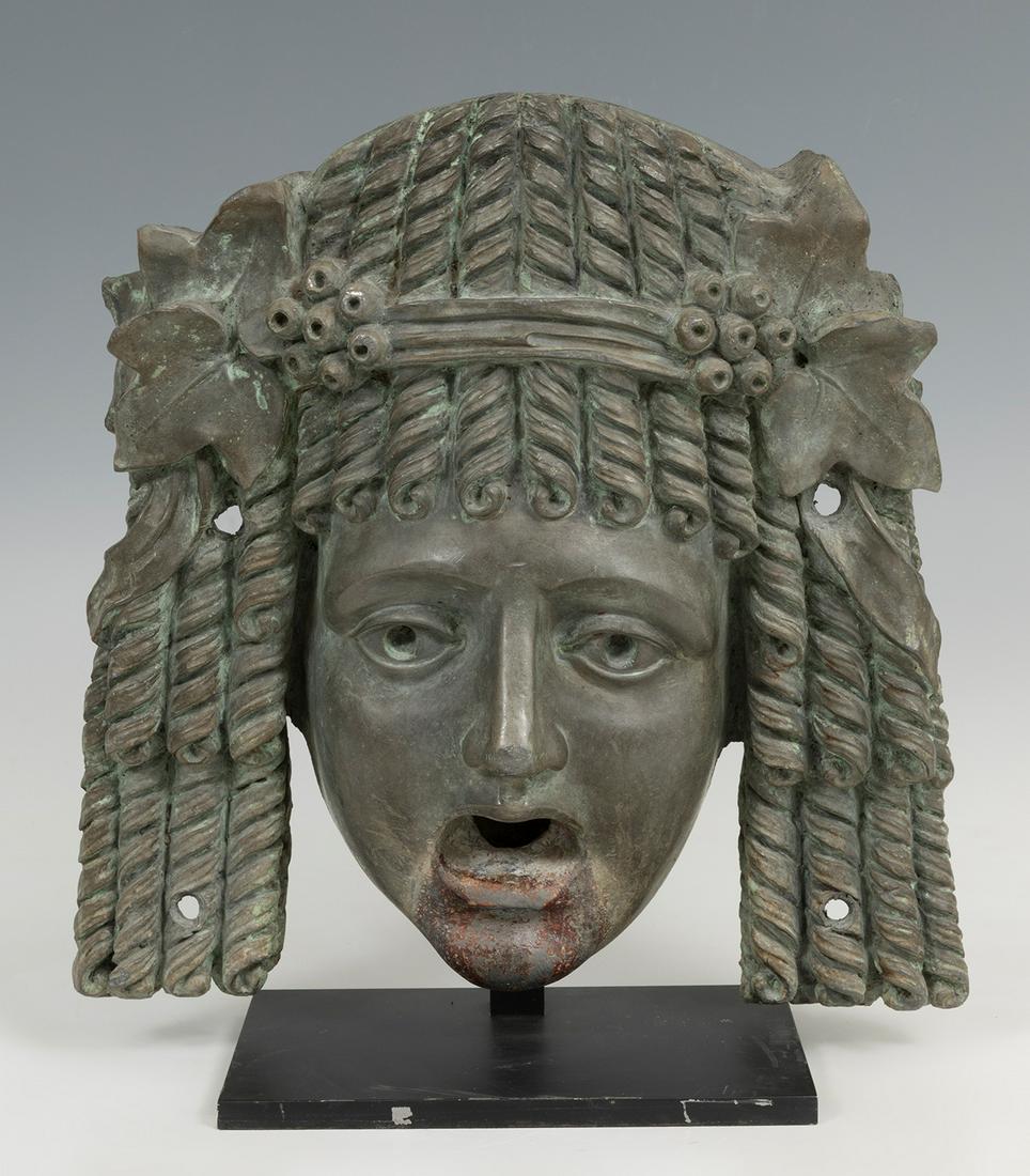 Fountain spout with theatrical mask; Italy, c. 1930. Bronze. Mounted on a metal base. Provenance: (1 of 7)