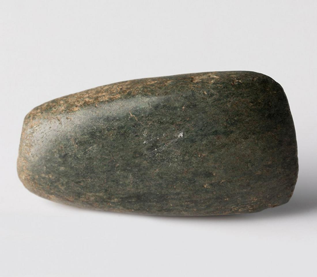 Miniature axe head from the Neolithic period, 5000-3000 BC. Stone.  Provenance: collection Bengt (1 of 3)