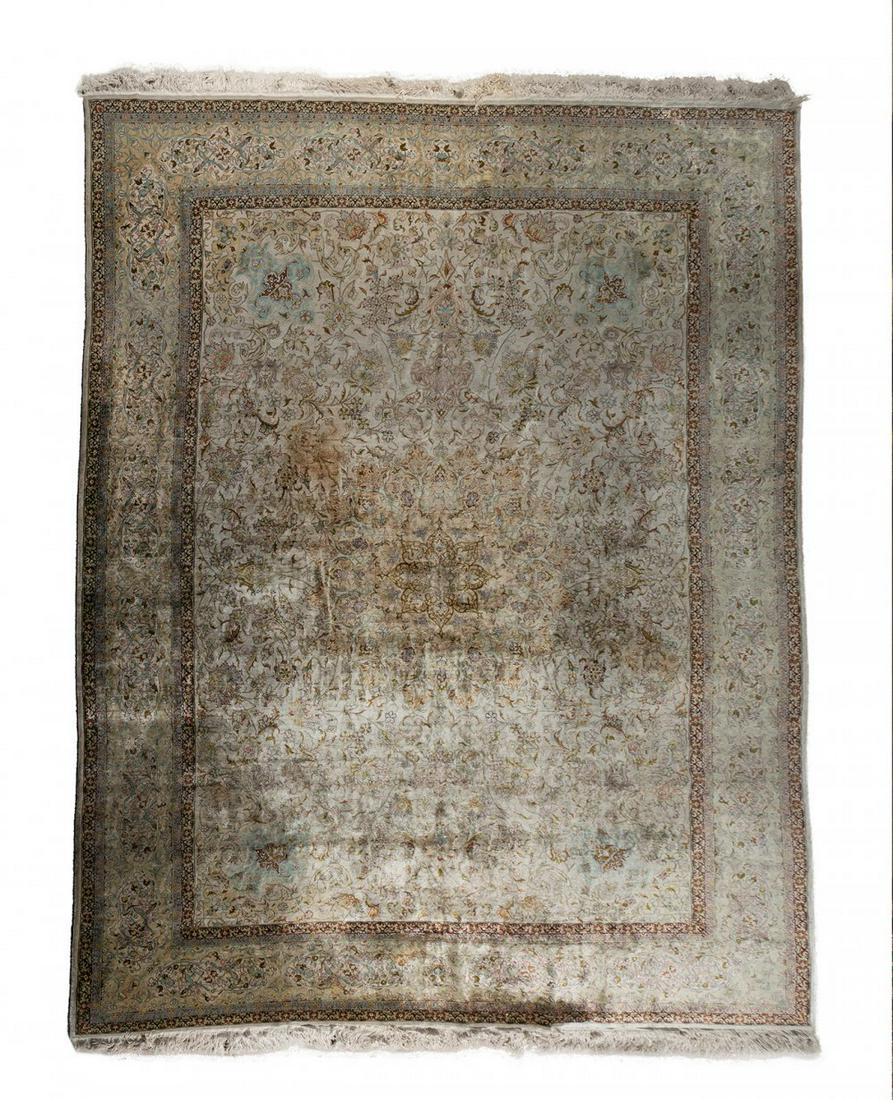 Persian rug; Iran, circa 1970. Wool and silk. 640,000 knots/m2. It has flaws and discolored areas. (1 of 4)
