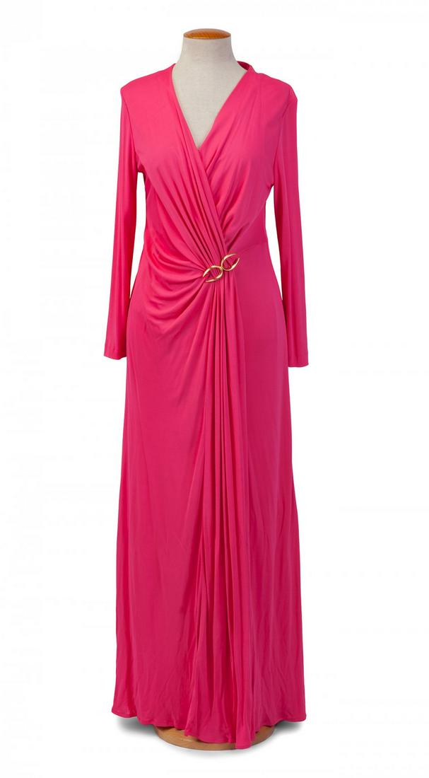ESCADA. Long flowing silk dress in fuchsia with draping in the center and gold metal brooch. Long: ESCADA. Long flowing silk dress in fuchsia with draping in the center and gold metal brooch. Long sleeves. Measurements: 154 cm (length). Size 40.