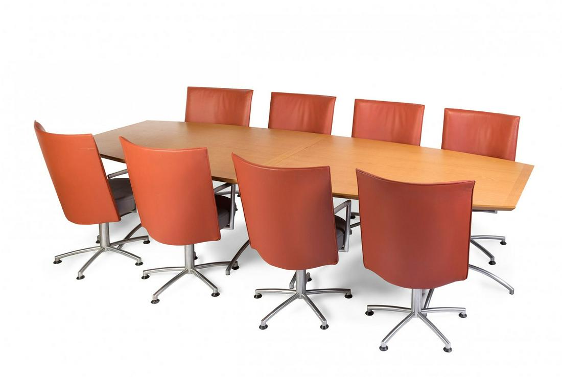 JOHANNES FOERSOM (Denmark, 1947). Boardroom table and 8 chairs. Wooden top, aluminium feet. Chairs: JOHANNES FOERSOM (Denmark, 1947). Boardroom table and 8 chairs. Wooden top, aluminium feet. Chairs upholstered in leather (quince-coloured back, grey seat). Slight stains. Some flaws and scratches in