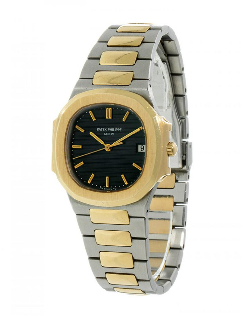 PATEK PHILIPPE Nautilus model for men/unisex. Case in 18kt yellow gold. Black dial with luminescent (1 of 3)
