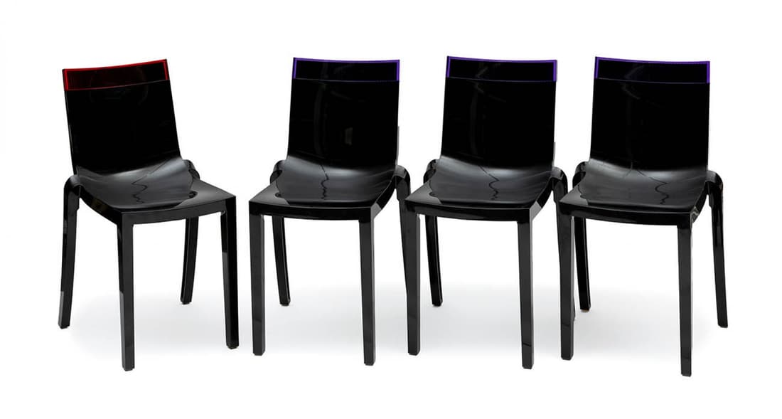 Design by PHILIPPE STARCK (Paris, 1949) and EUGENI QUITLLET (Ibiza, 1972). Four "Hi Cut" chairs.: Design by PHILIPPE STARCK (Paris, 1949) and EUGENI QUITLLET (Ibiza, 1972). Four "Hi Cut" chairs. Black polycarbonate. Measurements: 85 x 46 x 53 cm. This chair with its simple, eclectic form has becom