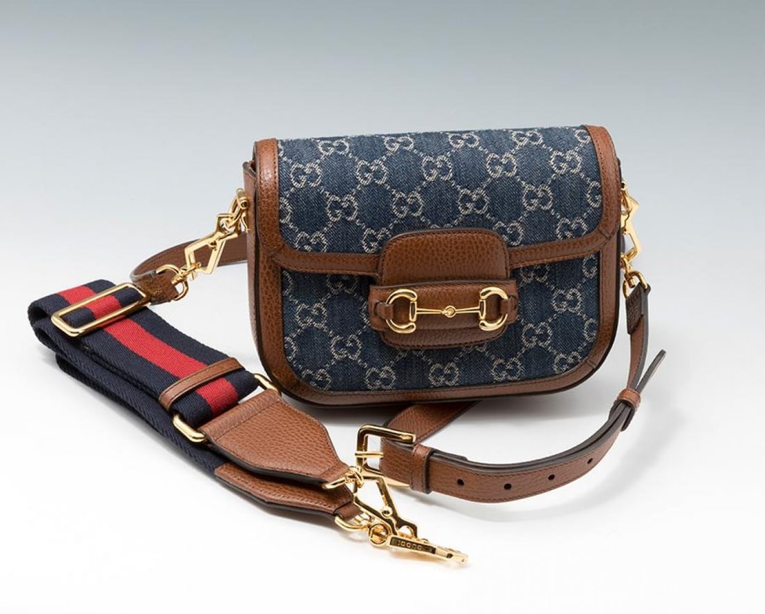 GUCCI.  Horsebit 1955 bag.  In denim and brown leather. Horsebit detail on the front. Gold metal (1 of 7)