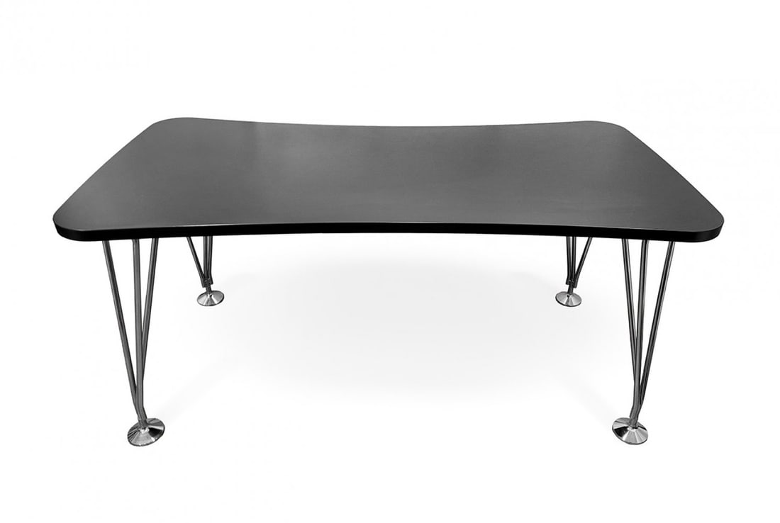 BRUNO MATHSSON (Sweden, 1907 â€“ 1988) & PIET HEIN (Denmark, 1905 â€“ 1996) for Fritz Hansen. Table.: BRUNO MATHSSON (Sweden, 1907 - 1988) & PIET HEIN (Denmark, 1905 - 1996) for Fritz Hansen. Table. Black lacquered wood and chromed steel legs. The legs show slight marks of use. Measurements: 74 x 160