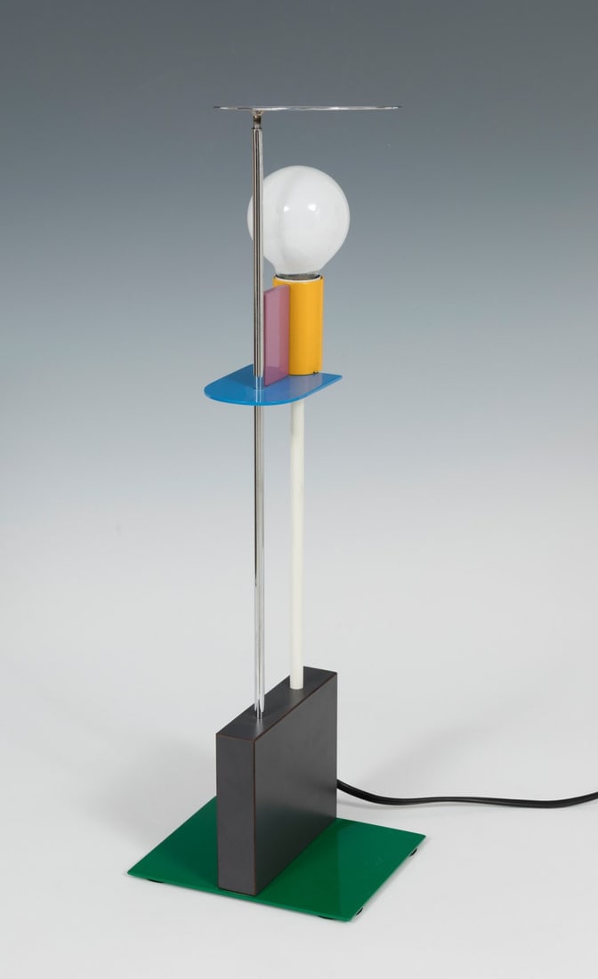 Piccadilly lamp by GERARD TAYLOR for MEMPHIS. Lacquered metal in various colors.: Piccadilly lamp by GERARD TAYLOR for MEMPHIS. Lacquered metal in various colours. Measurements: 47,5 x 12 x 15 cm. This is a table lamp designed by Gerard Taylor for Memphis Milano. The Piccadilly lam