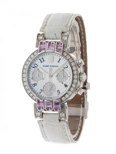 HARRY WINSTON Premier watch, No. referee. 200UCQ32W, for women.: HARRY WINSTON Premier watch, No. referee. 200UCQ32W, for women. 18 kt white gold case with a circular bezel outlined with diamonds and pink sapphires, baguette cut. Mother-of-pearl dial with Arabic nu