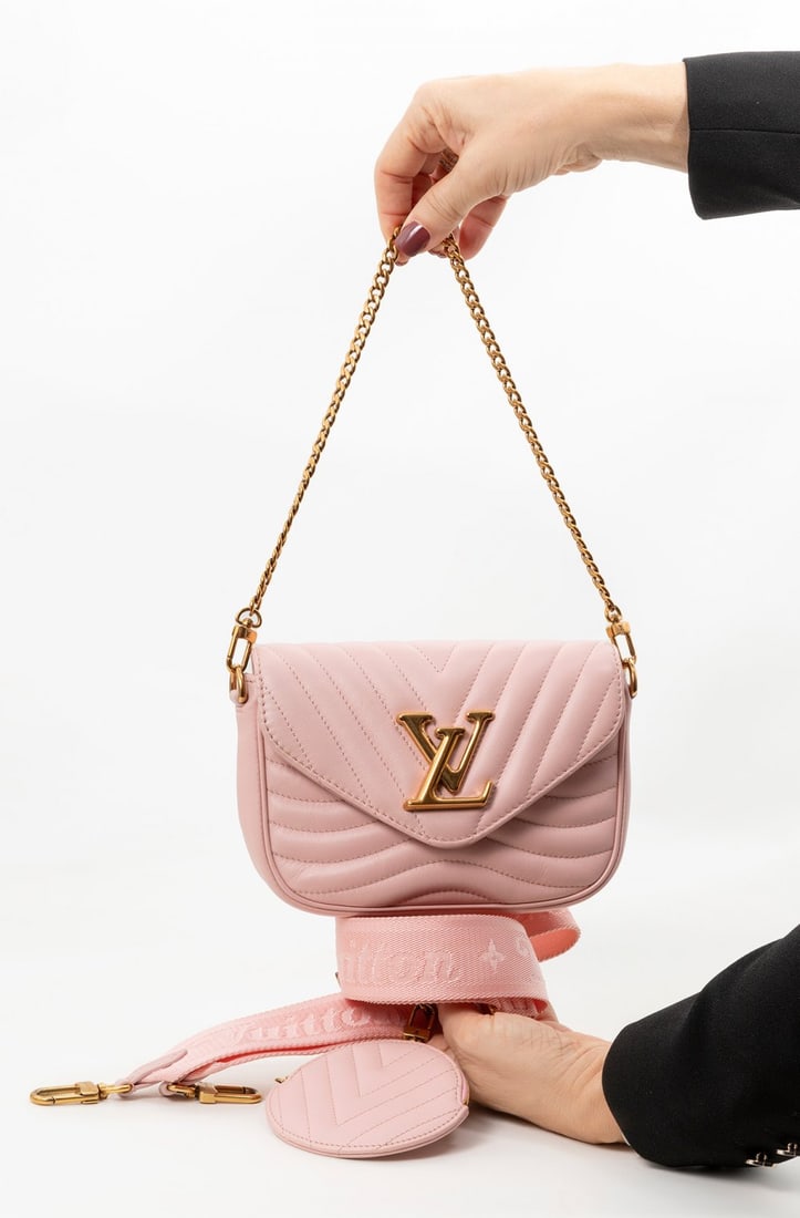 LOUIS VUITTON. Wave Pochette bag. (1 of 5)