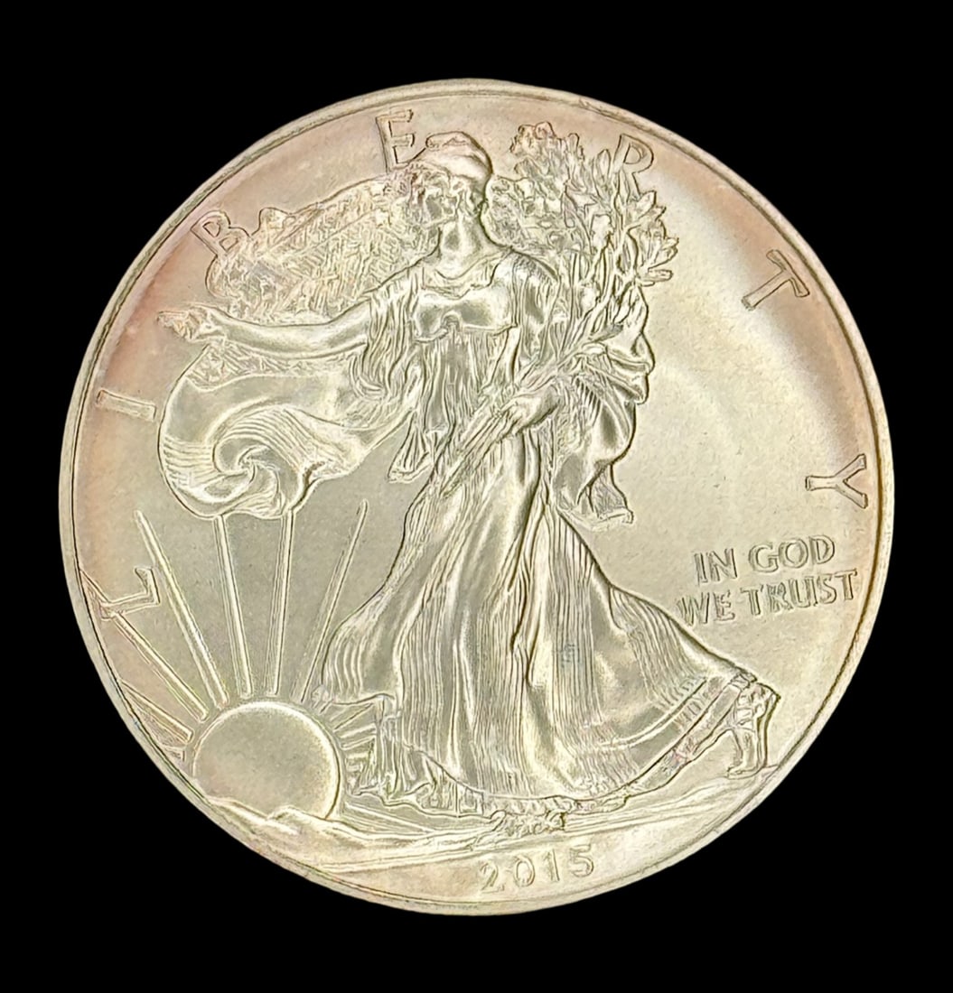 2015 One Dollar Silver Eagle: This 2015 one dollar silver eagle is not graded. It is one troy ounce of .999 pure fine silver. [GG]