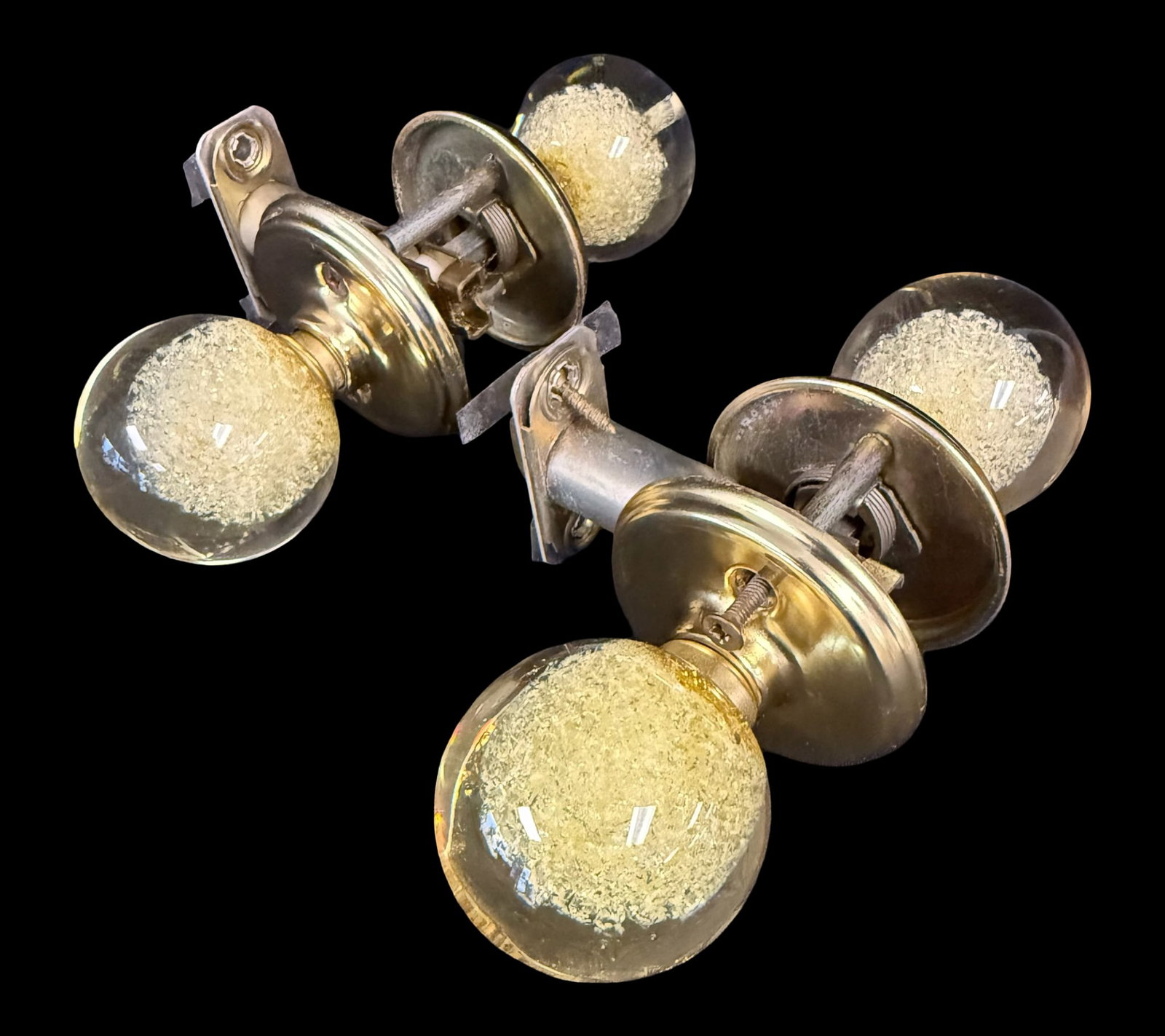 MCM Ruth Richmond Weiser Lucite Shard Doorknobs: These iconic doorknobs were created by mid-century modern developer and interior designer Ruth Richmond. They feature an inner core embedded with shards, suspended within clear round acrylic lucite.