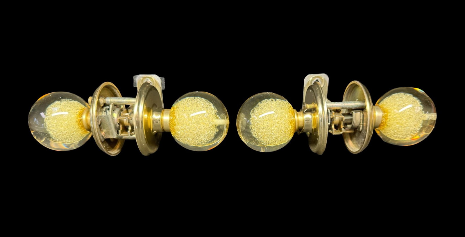 MCM Ruth Richmond Weiser Lucite Shard Doorknobs: These iconic doorknobs were created by mid-century modern developer and interior designer Ruth Richmond. They feature an inner core embedded with shards, suspended within clear round acrylic lucite.