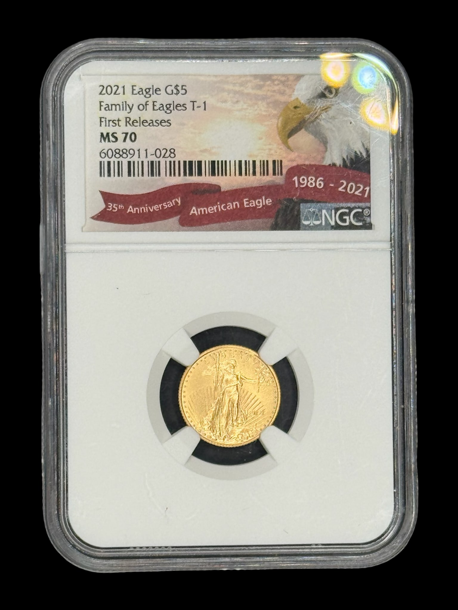 2021 Five Dollar Gold Eagle Coin: This 2021 five dollar Gold Eagle is graded MS 70 by NGC. It is a Type 1 version of the “Family of Eagles” design, seen on the reverse. It is designated “First Releases.” The coin weigh