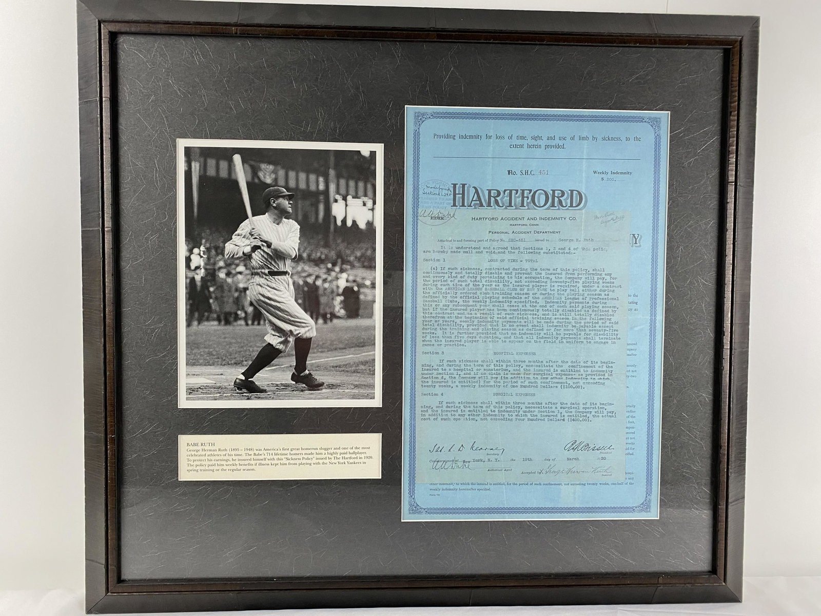 Framed Copy of Babe Ruth's Disability policy 1920: Babe Ruth photo and his â€œDisability sickness policy” dated March 19, 1920. Height: 24 1/4 inches Width: 27 1/4 inches