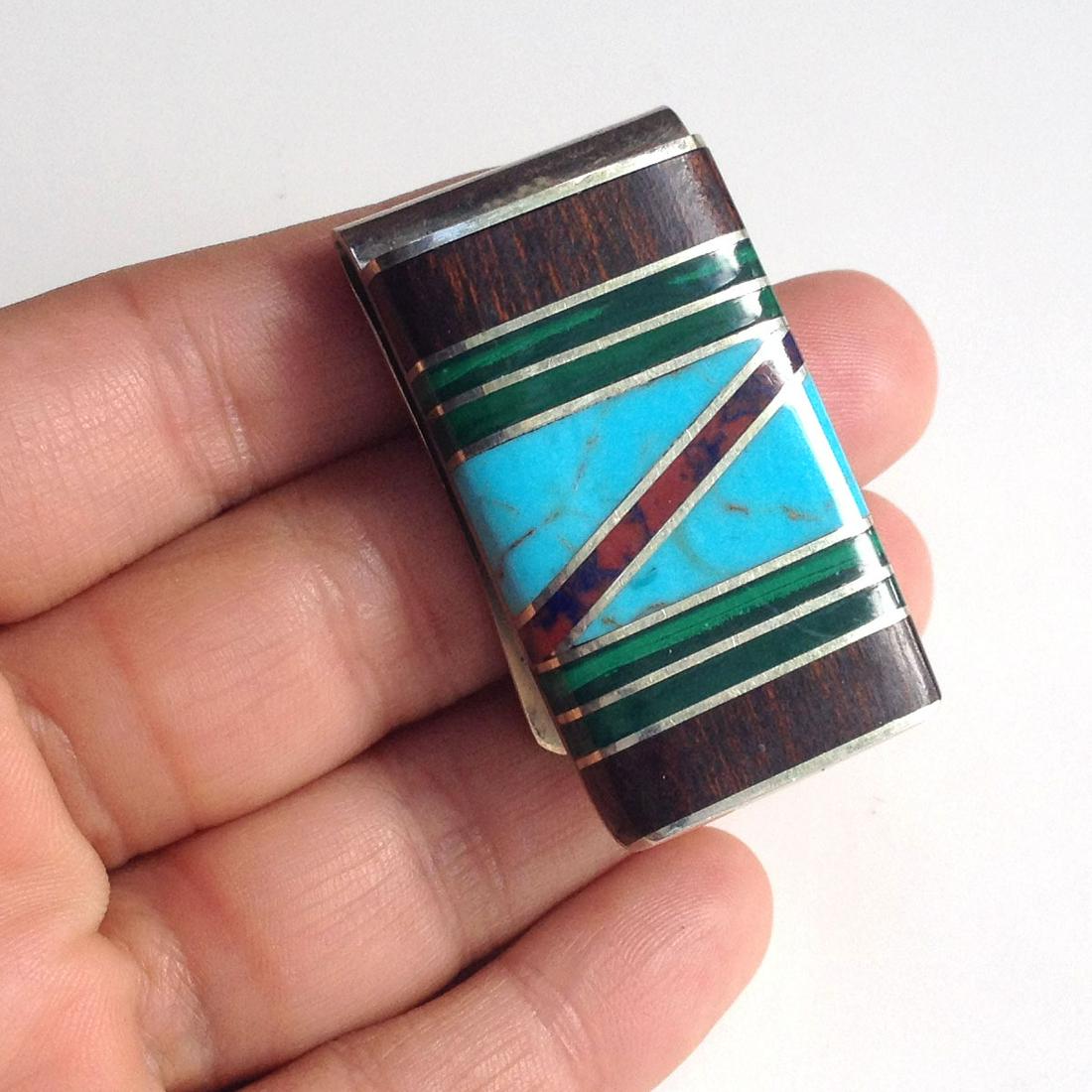 Vintage silver tone money clip wood turquoise malachite: Vintage silver tone money clip with dark wood turquoise malachite and jasper inlays. Hallmarked RC and nickel silver. Measured 1 5/8 x 7/8 inches. Condition very good.
