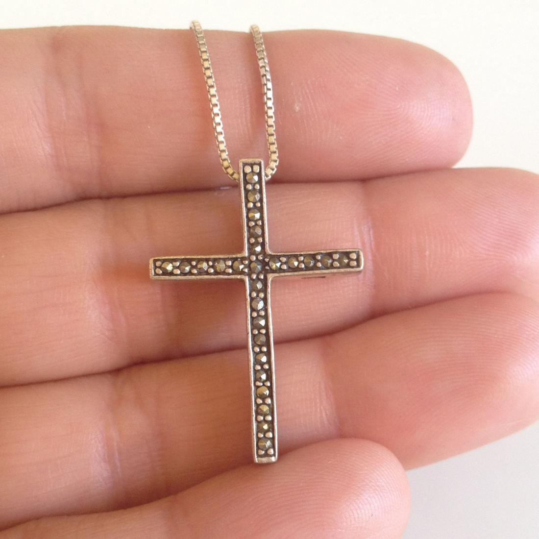Sterling silver Cross and box chain necklace marcasites: Sterling silver Cross pendant and box chain necklace with marcasites. Weight 5.77 grams. Hallmarked 925 A Thailand. Hallmarked Italy on chain. Pendant length 1 1/8 inches, chain length 18 inches. Cond