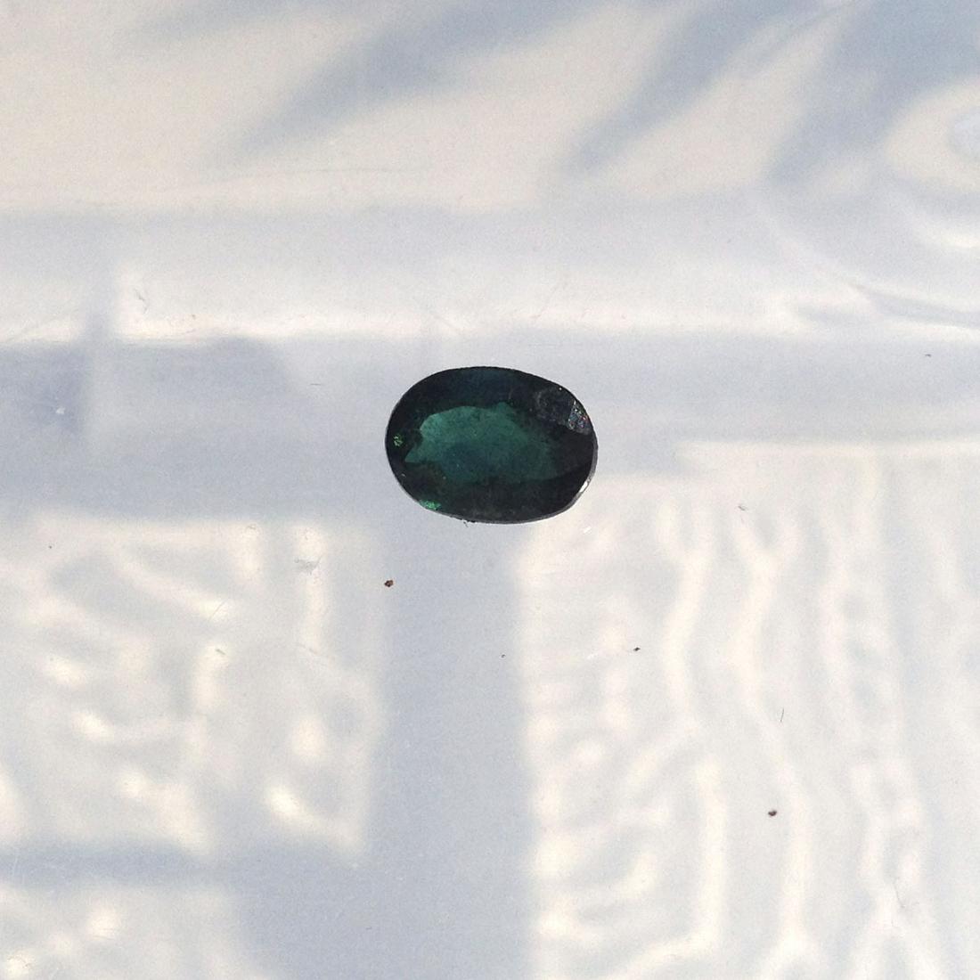 Dark green oval shape faceted tourmaline 1.05 cts (1 of 2)