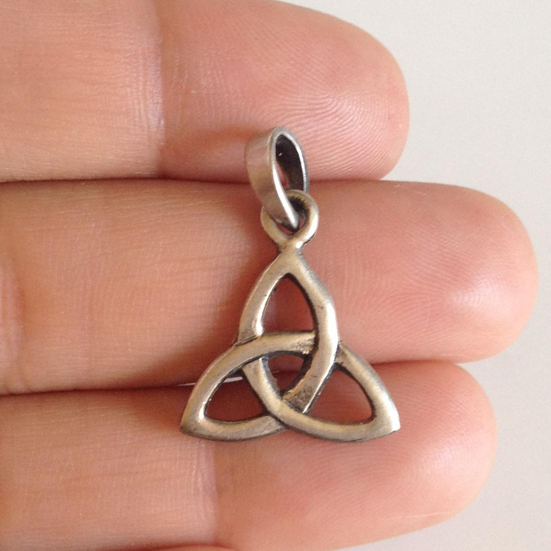 Sterling silver Triquerta Symbol pendant charm: Sterling silver Triquerta Symbol pendant charm. Weight 2.05 grams. No hallmark but tested 925. Length 1 inch with bail. Condition excellent.