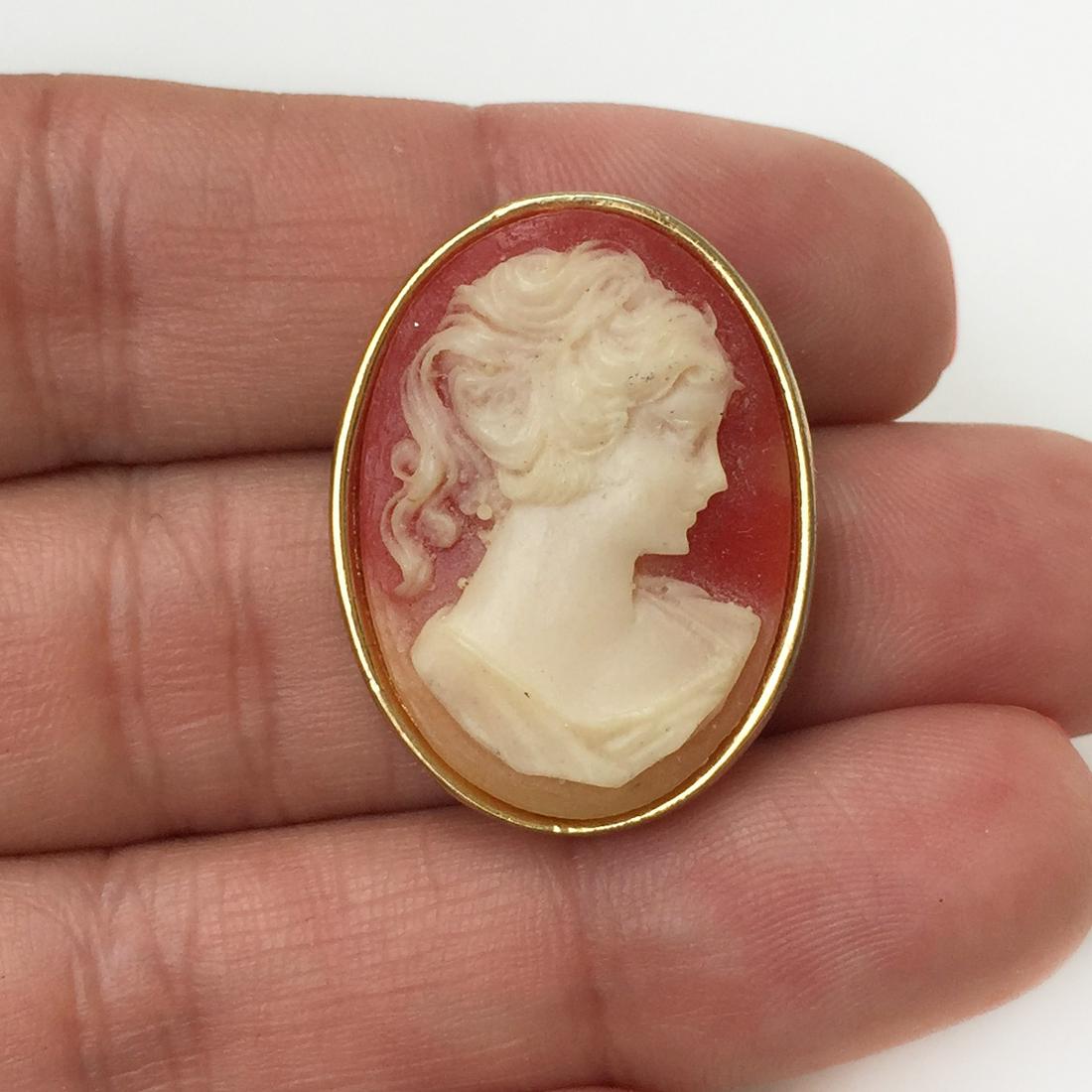 Brooch with hotsell woman's face