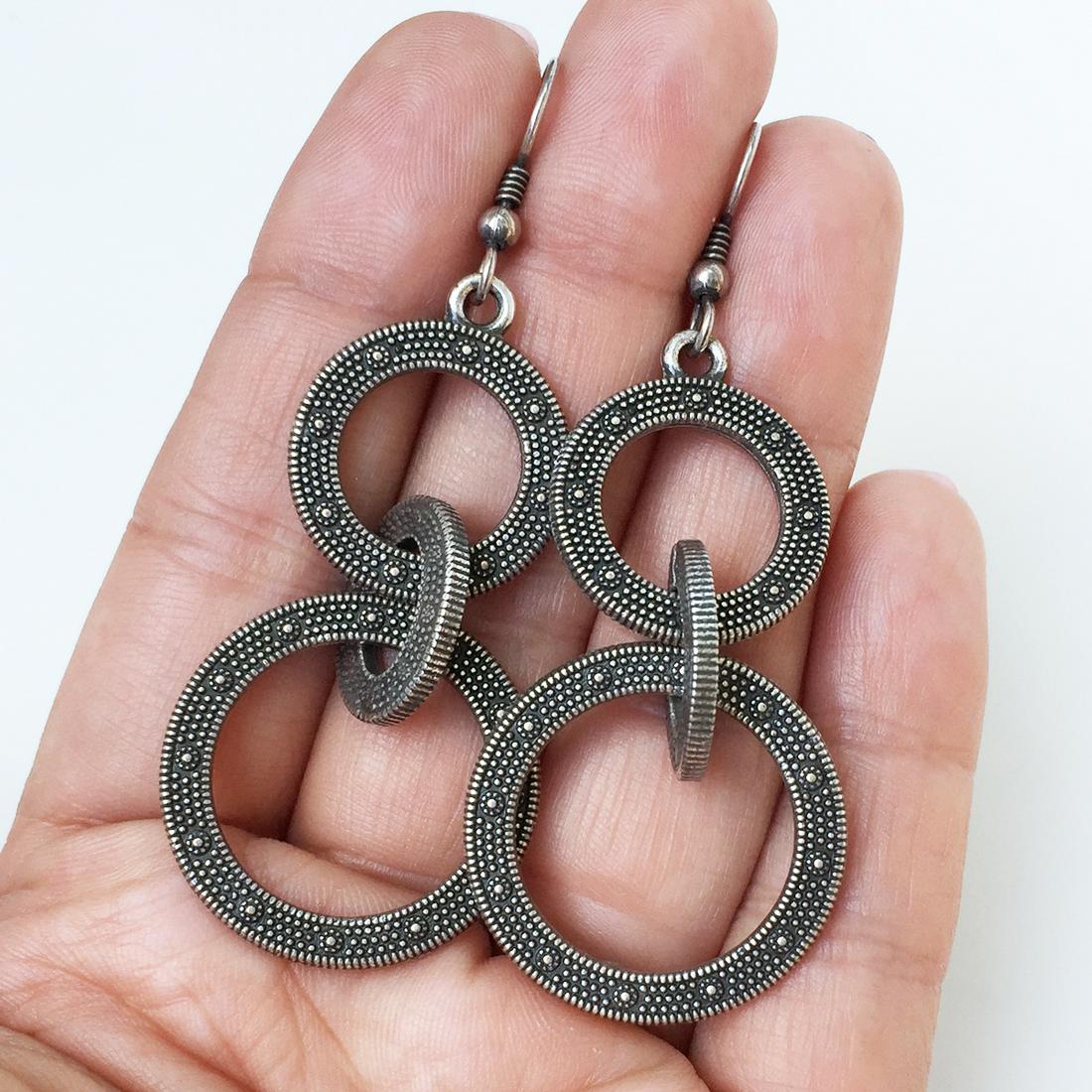 Silver tone textured finish dangling circle earrings (1 of 3)