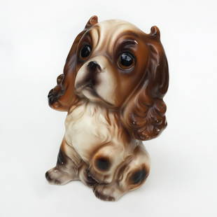 CHOICE IMPORTS: Vintage ceramic Puppy Dog figurine 5": CHOICE IMPORTS: Vintage ceramic brown, black and white Cocker Spaniel Cavalier Charles King Dog Puppy figurine statuette, Japan, 5 inches. Measured 2 1/2 x 3 1/4 x 4 7/8 inches. Item has a sticker Cho