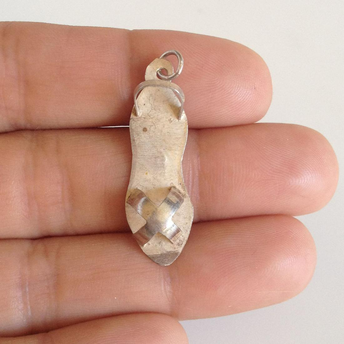 Sterling silver Sandal Shoe pendant charm: Sterling silver Sandal Shoe pendant charm. Weight 1.0 gram. Hallmarked 925. Length 1 3/8 inches with bail. Condition very good.