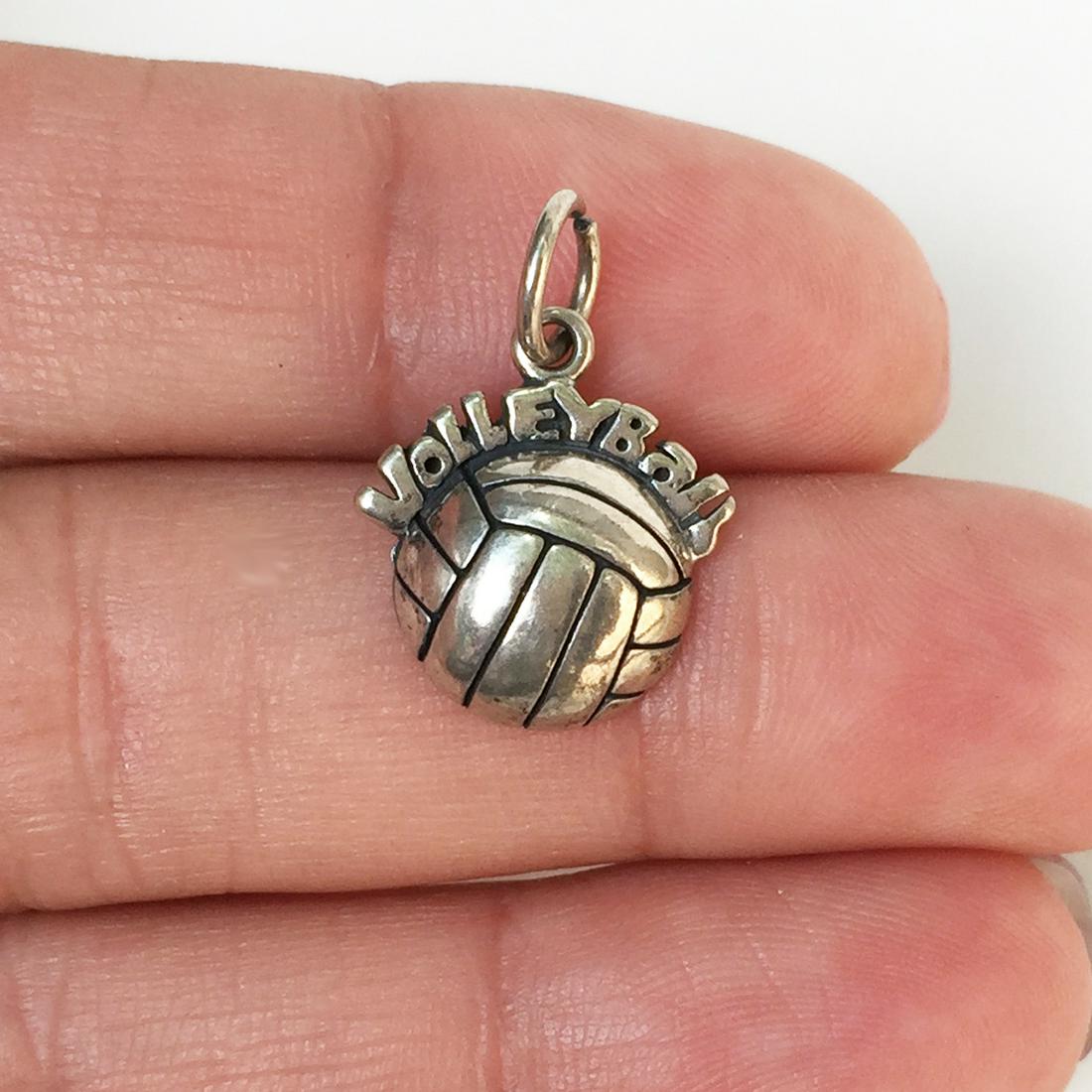 Sterling silver Volleyball pendant charm: Sterling silver Volleyball pendant charm. Weight 1.79 grams. Hallmarked S . Tested 925. Length 7/8 inches with bail. Condition very good.