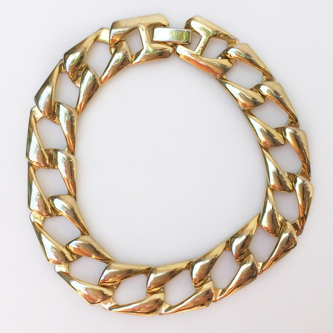 Vintage gold tone flat Cuban link bracelet: Vintage gold tone flat Cuban link bracelet. Length 7 1/2 inches. Condition excellent.