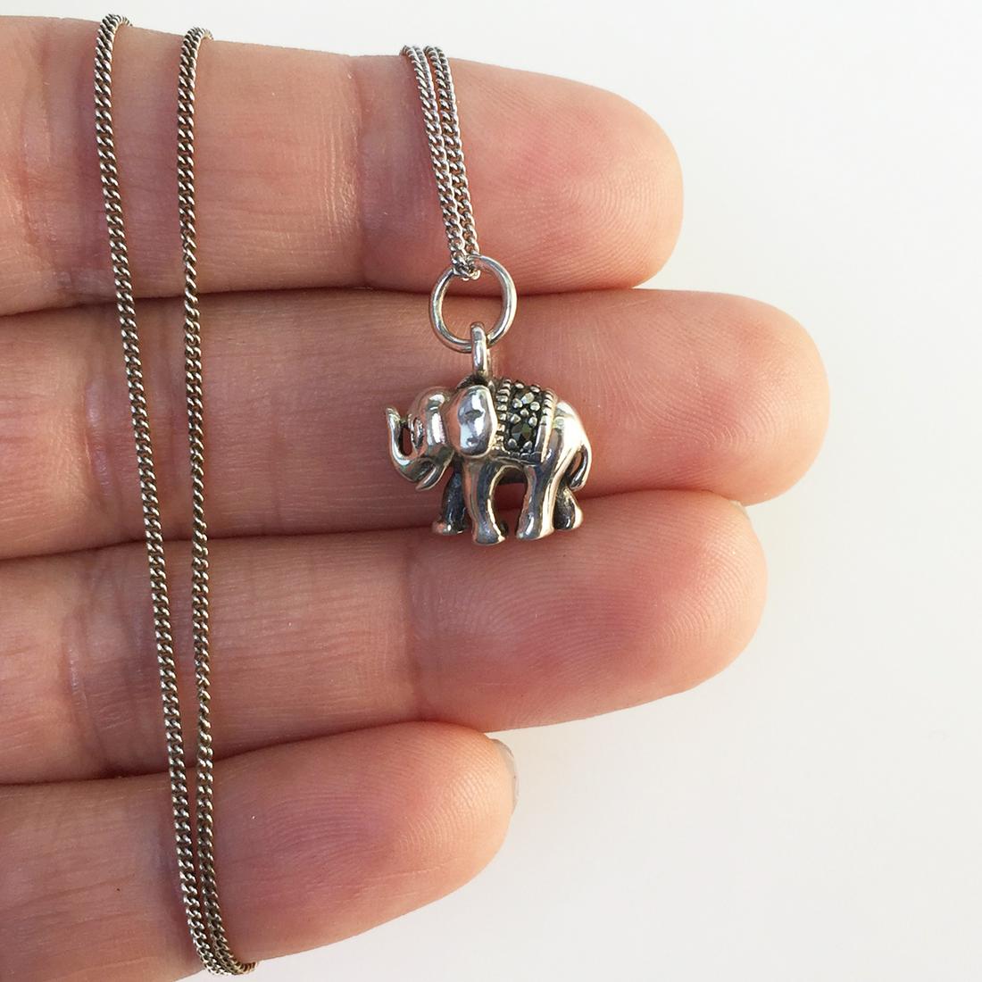 Sterling silver marcasites Elephant pendant chain: Sterling silver marcasites Elephant pendant and chain necklace. Weight 5.00 grams. Hallmarked 925 SLC Thailand. Pendant length 3/4 inches with bail, chain length 18 inches. Condition very good.