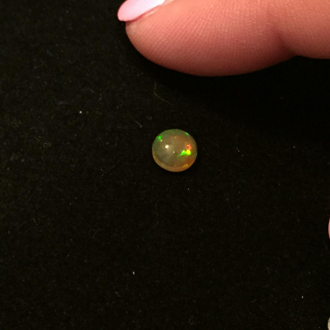 Round cabochon Welo Ethiopian opal 0.35 cts (1 of 3)