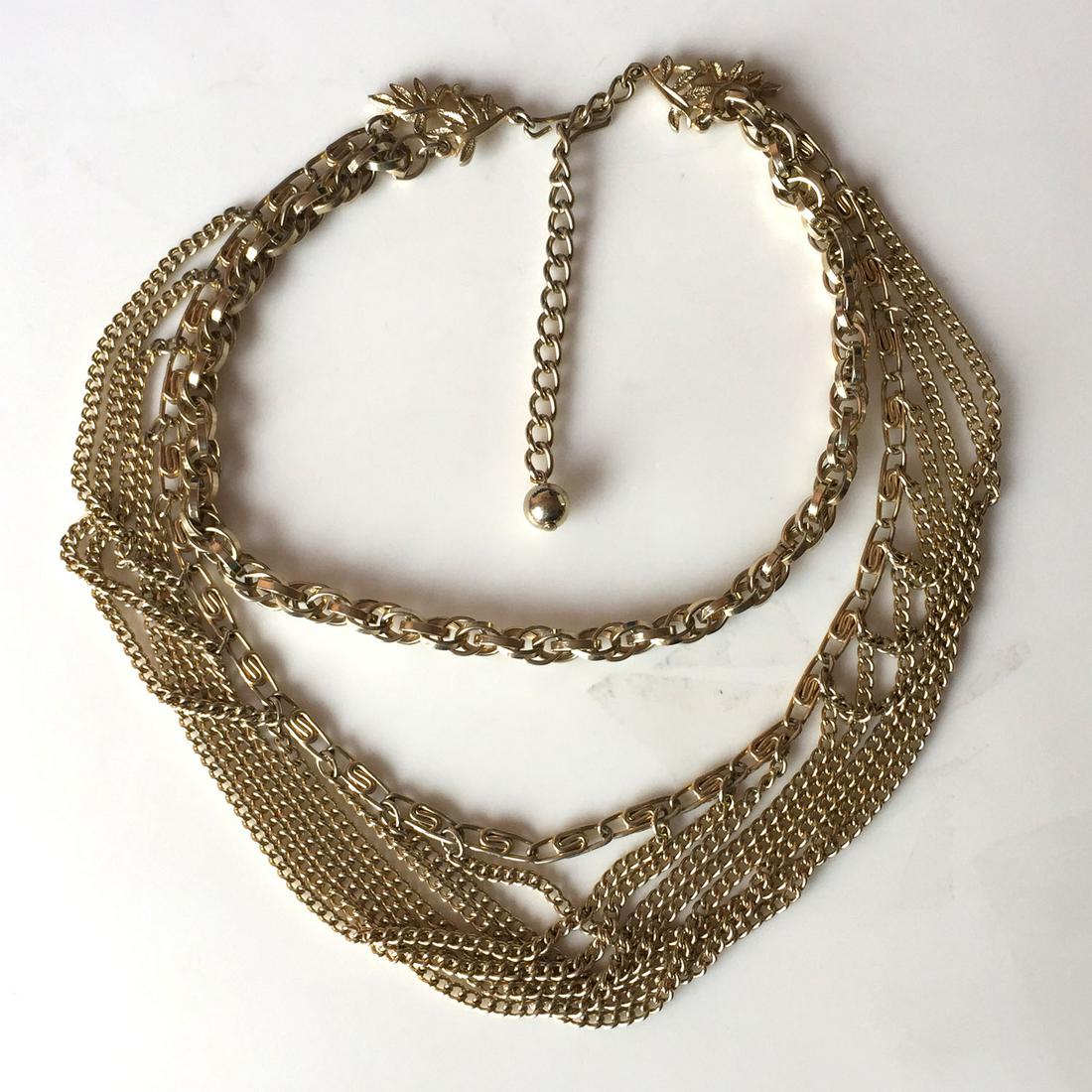 Gold tone multichain necklace with leaf design (1 of 3)