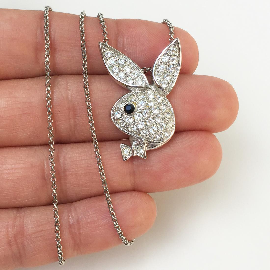 Silver tone crystals Playboy Bunny pendant chain: Silver tone clear crystals Playboy Bunny pendant and chain necklace. Chain length 16 inches + 2 1/2 inches, pendant length 1 1/4 inches. Condition very good.