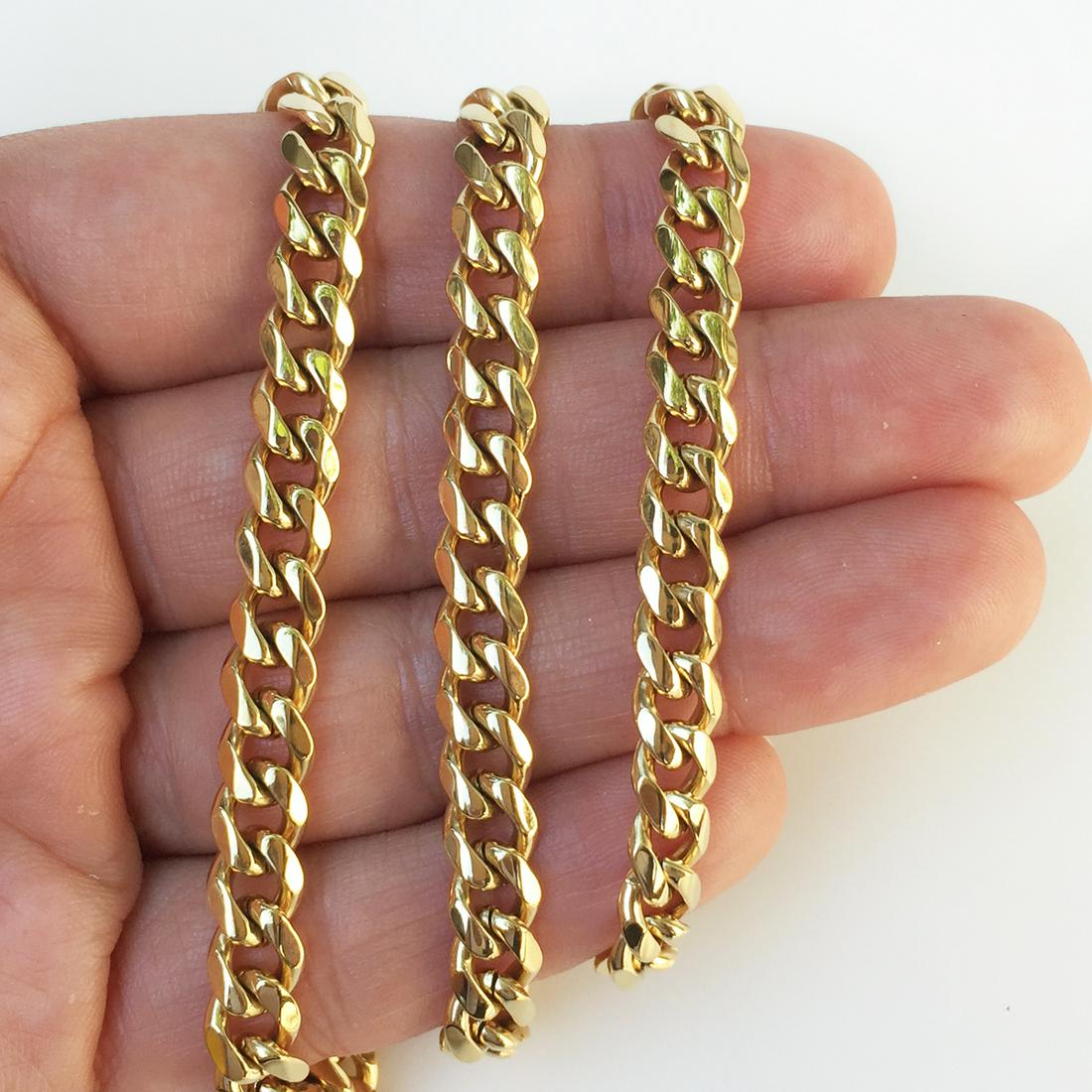 Gold tone stainless steel Cuban link chain, 24 inches (1 of 2)
