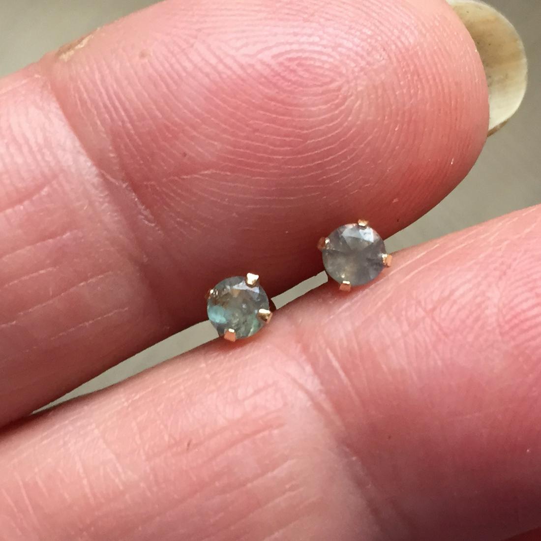 14K Yellow gold round faceted Alexandrite stud earrings: 14K Yellow gold round faceted Alexandrite push back stud earrings. Alexandrites total weight 0.44 cts. Measured 3.5 mm in diameter. Condition excellent.