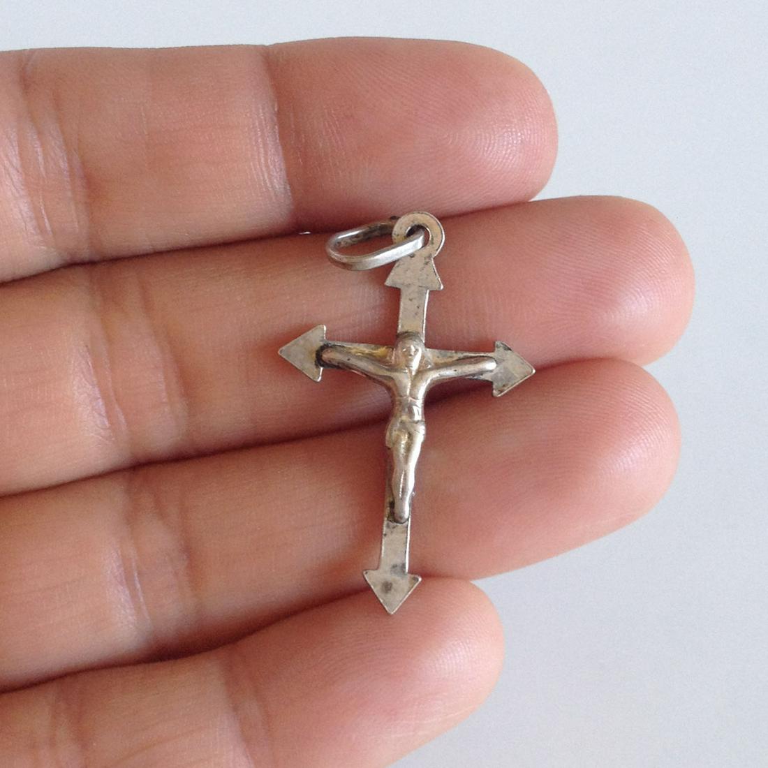 Sterling silver Cross Jesus pendant charm: Sterling silver Cross Jesus pendant charm. Weight 1.68 grams. Hallmark 925. Length 1 1/2 inches with bail. Condition very good.